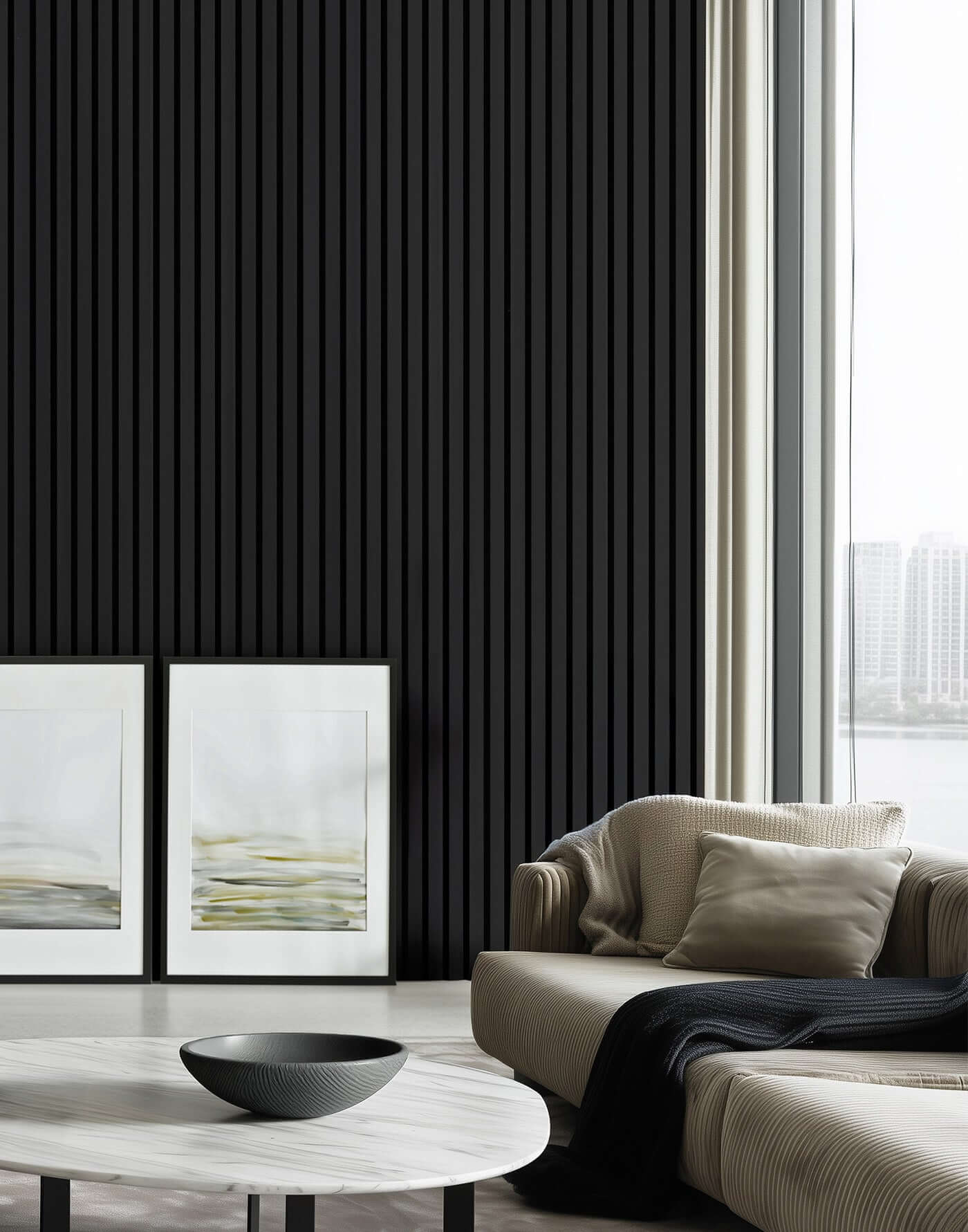 Modern interior with black acoustic slat wall panels, sleek couch, and framed art, enhancing style and sound in home or office space.