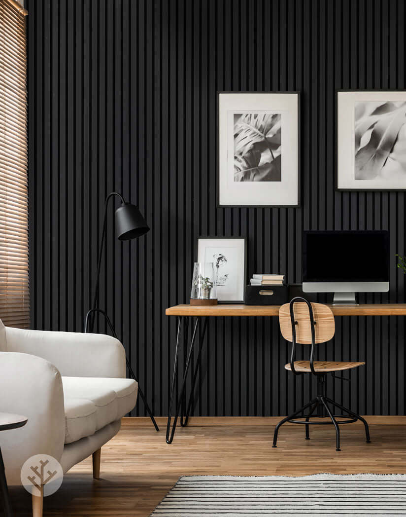 Modern interior with black acoustic slat wall panels, stylish decor, and desk with computer. Perfect for elegant home or office wall panelling.