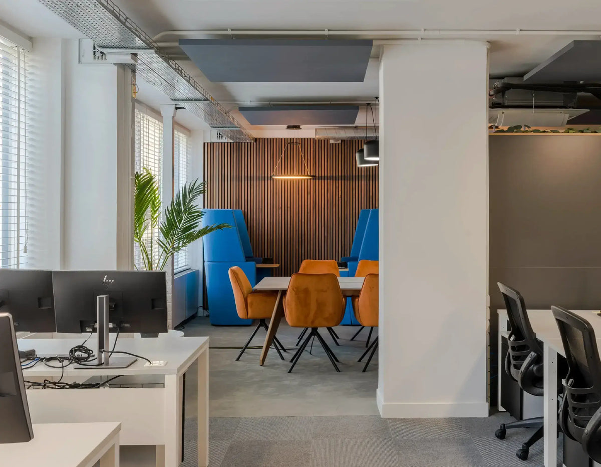 Arbor+co Interior Design studio's modern workplace with acoustic slat wood wall panels