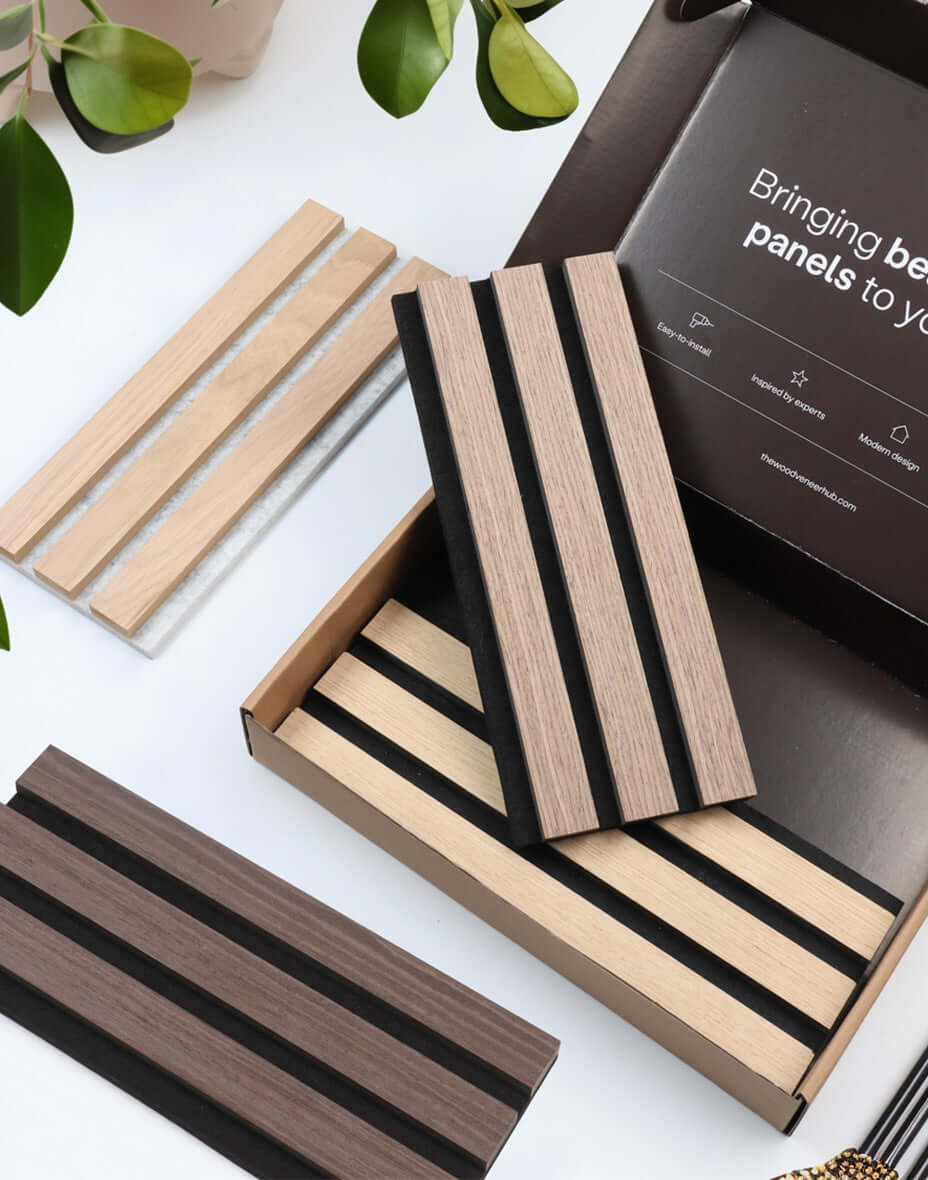 Acoustic slat wood wall panels sample box showcasing various wood finishes for interior design and wall panelling.