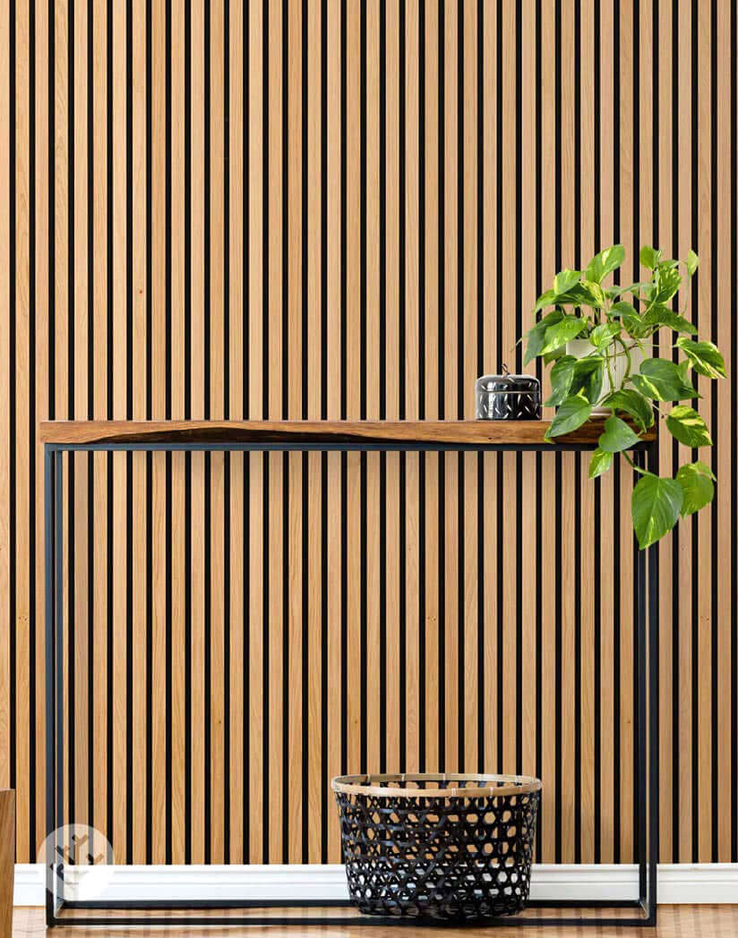 Natural Oak Acoustic Slat Wood Wall Panels enhancing modern interior with lush green plant and stylish console.