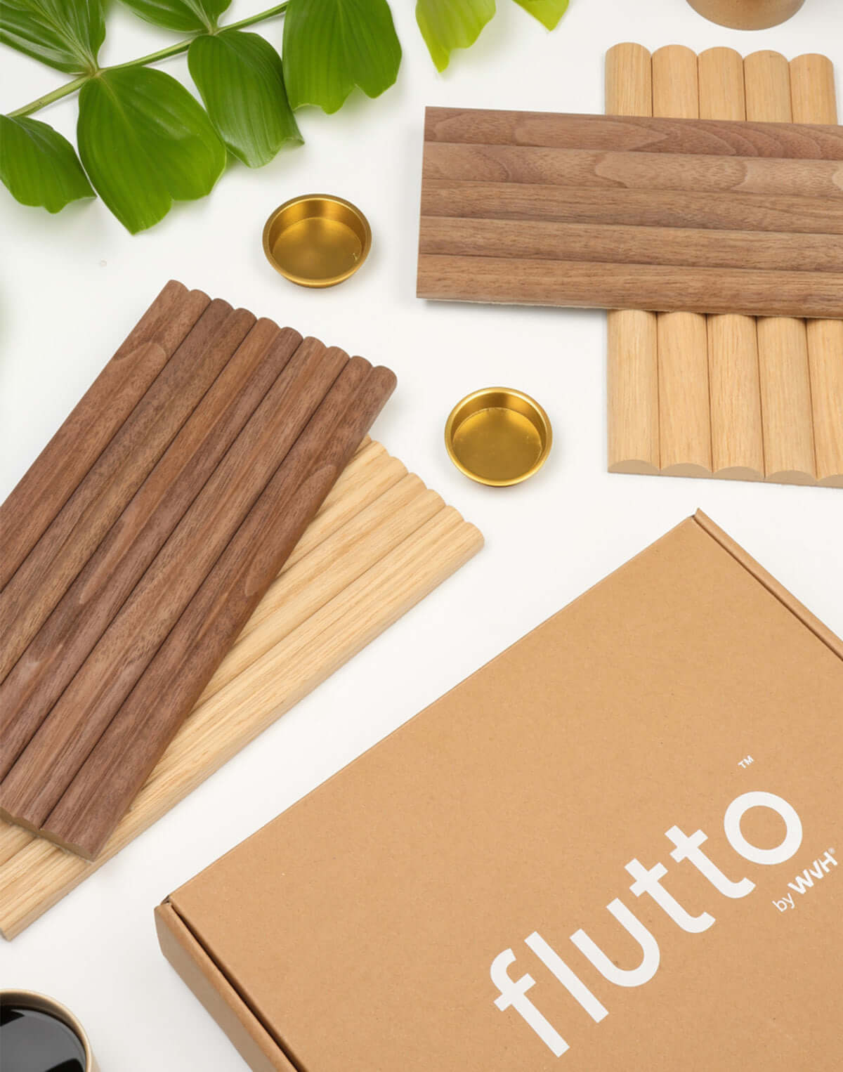 Flutto wood panel sample box showcasing flexible tambour designs in oak and walnut, ideal for creative applications.