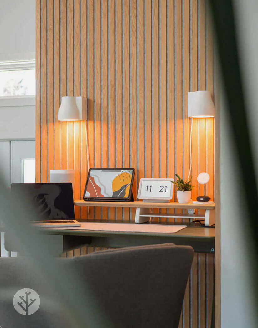 Natural Oak Grey Felt Acoustic Slat Wood Wall Panels in interior office setting with modern decor.