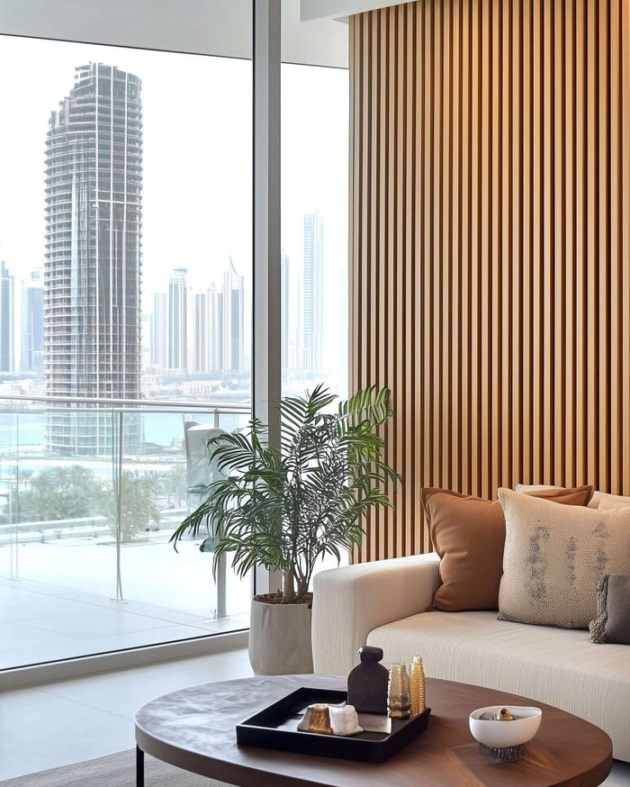 Contemporary living room with natural oak acoustic slat wall panels, enhancing interior aesthetics and sound quality.